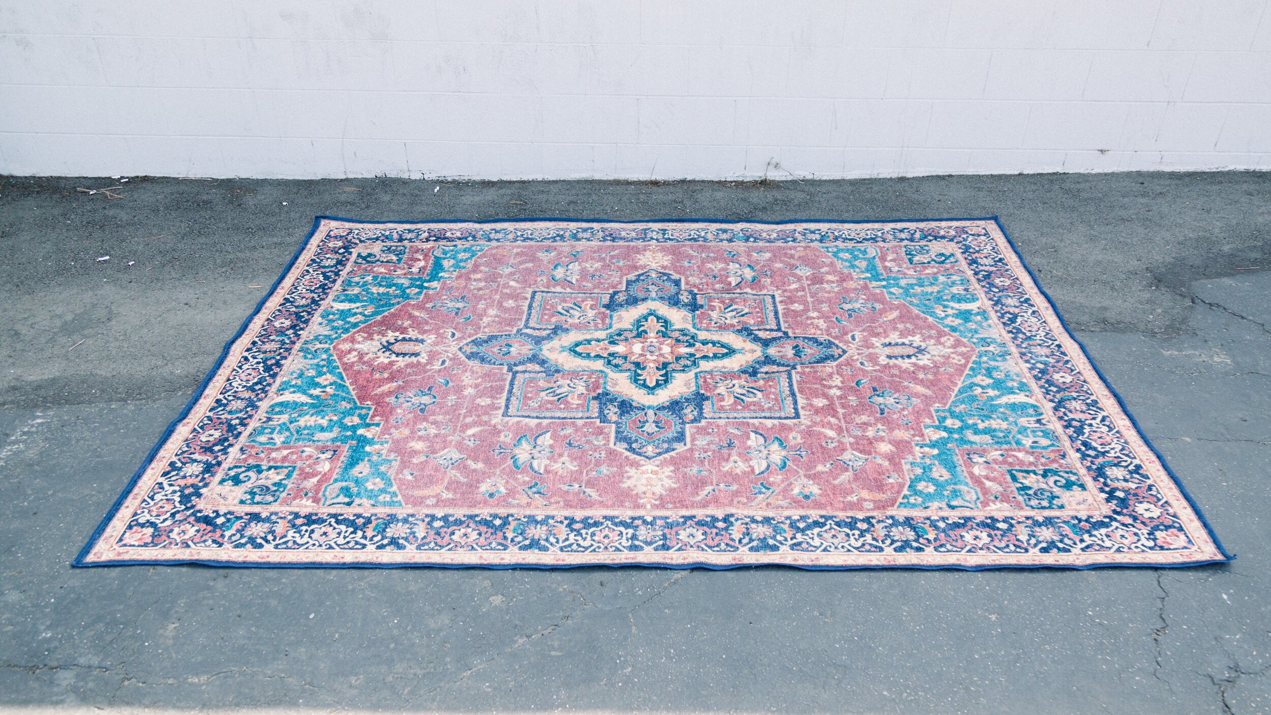 Marigold Peach and Indigo Rug — Provenance Rentals — Los Angeles