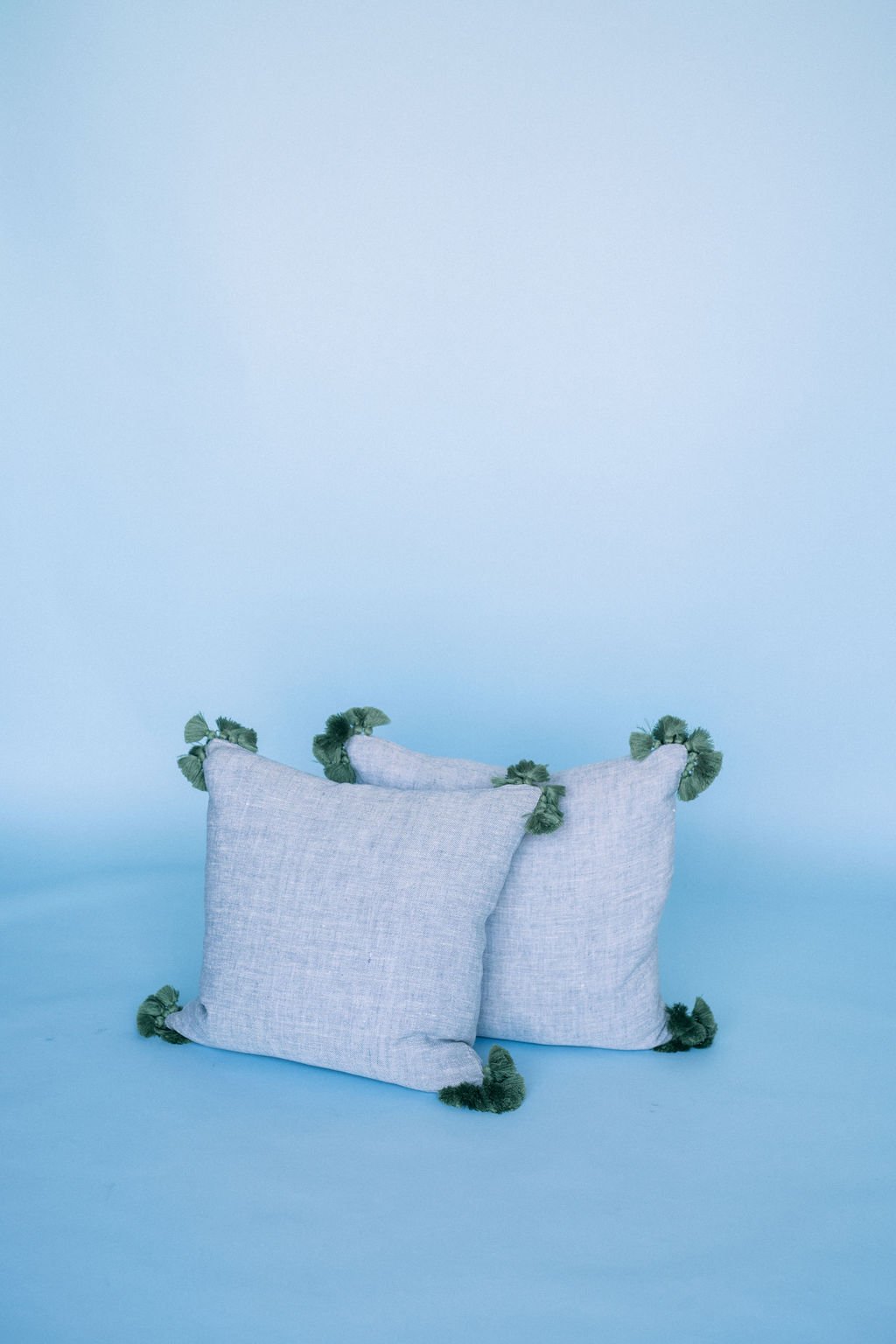 Baywood Blue Pillow with Green Tassels