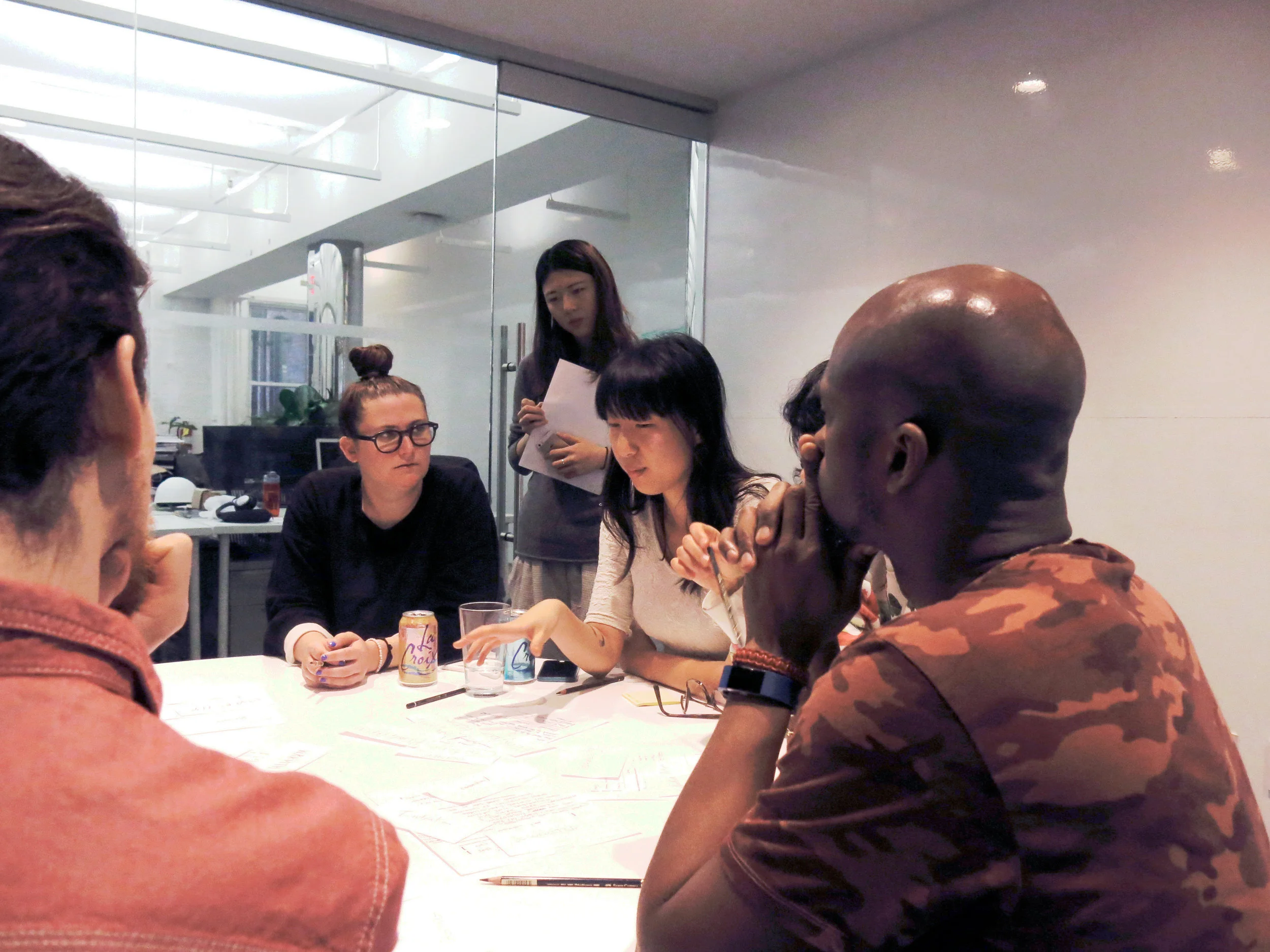 NEW INC members negotiate definitions and components of community values in a two-hour workshop.