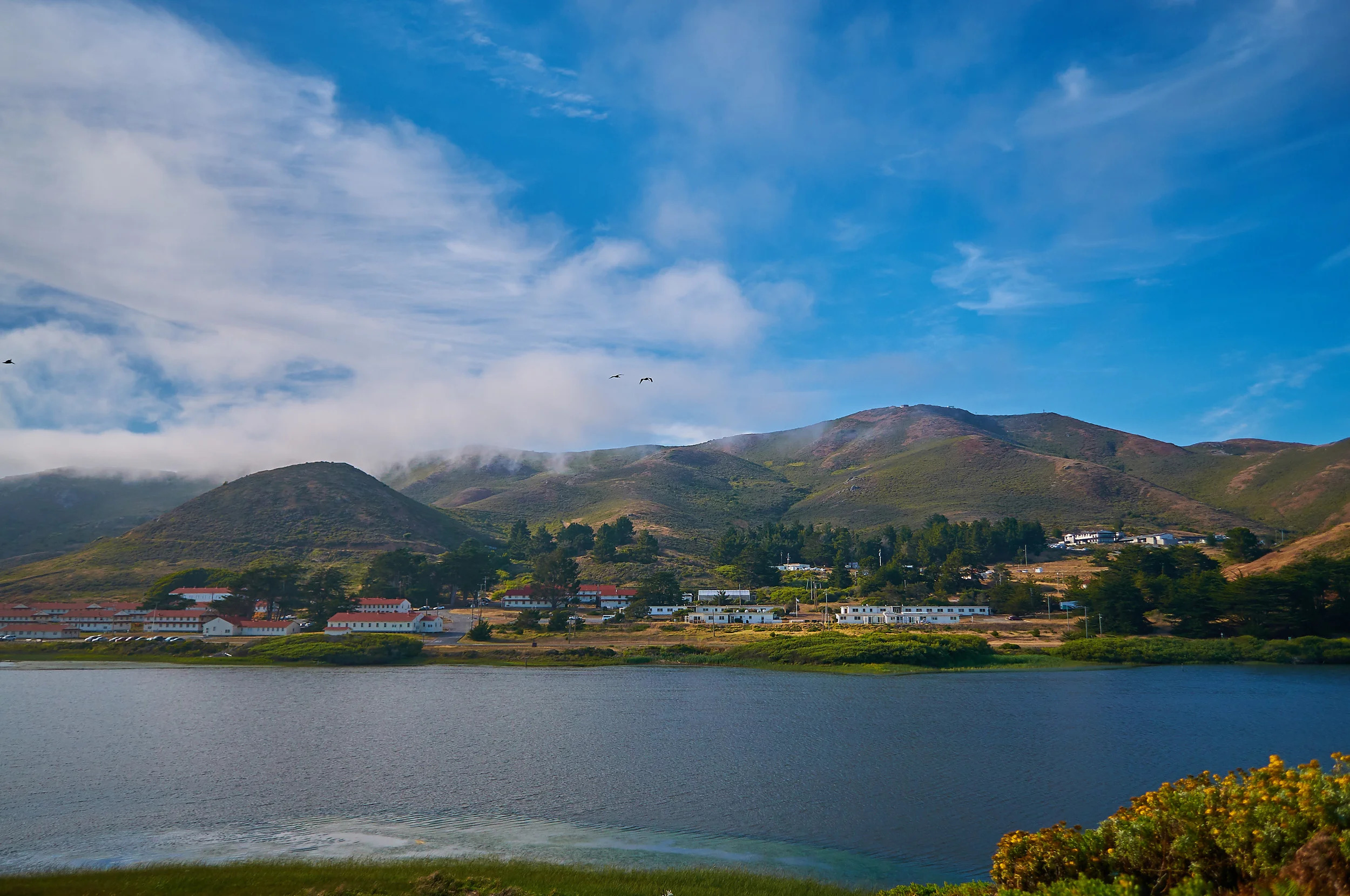 Blue skies and misty clouds meet above Rodeo Lagoon. Rodeo Beach Marin Headlands, California D300 18mm- 55mm Nikon lens
