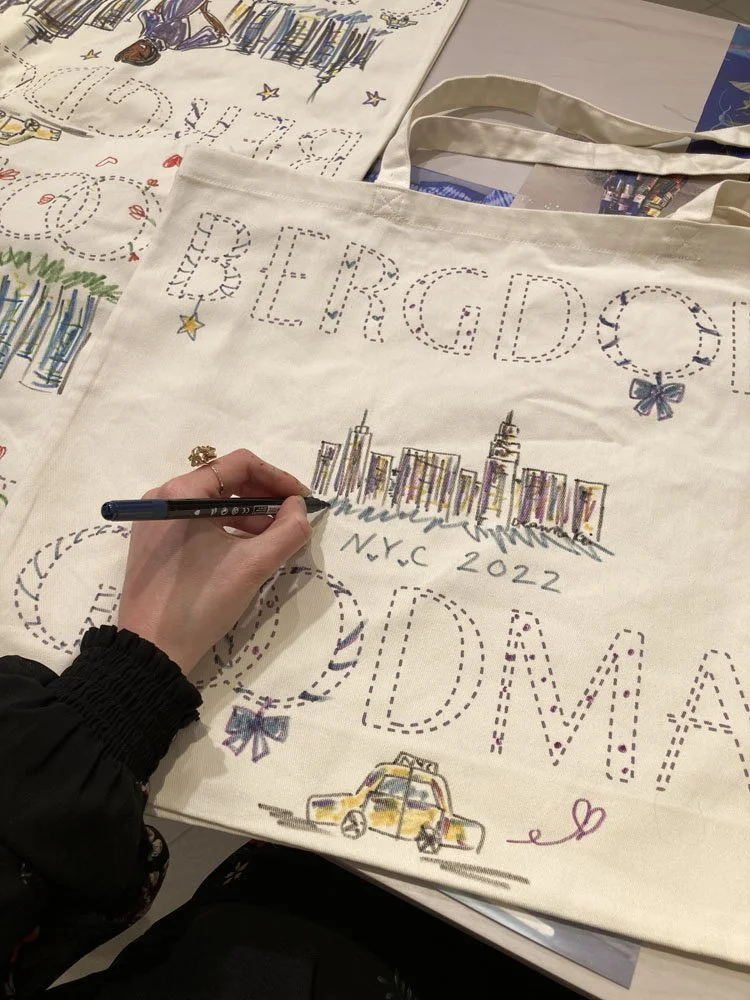 Deanna Kei live bag painting for Bergdorf Goodman