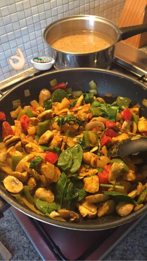 My 'Chicken Curry' - mix of spices and veggies with rice cooking