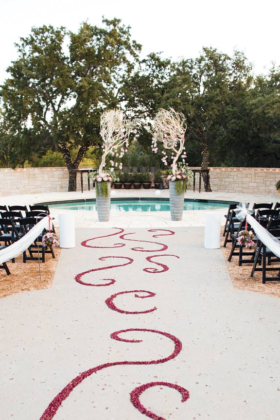 rosette wedding aisle | hanging orchid tree altarpiece | Austin, TX wedding photo: Jake Holt Photography