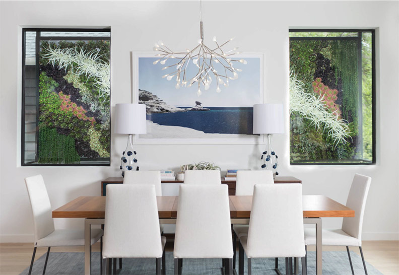 photo by: Jessica Pages | faux living walls | exterior privacy screens shielding close neighbors with style | dining room view