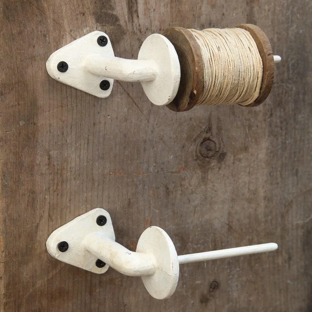 spool holder white on wall.jpg