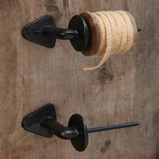 spool holder black on wall.jpeg