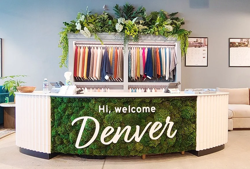 Joybird Denver | Preserved moss sign | Faux planting behind