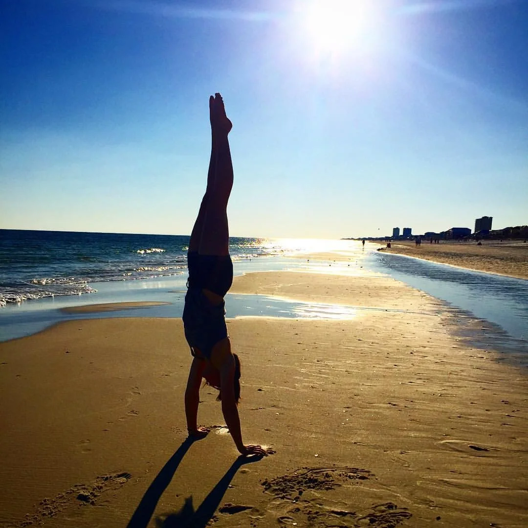 There's a 90% chance you'll find Lori in a handstand anywhere you see her.