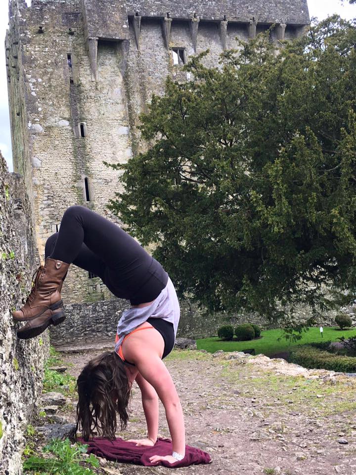 Jamie bending over backward on her trip to Ireland. 