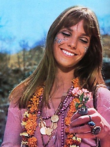 Jane Birkin with lovely flower face paint.