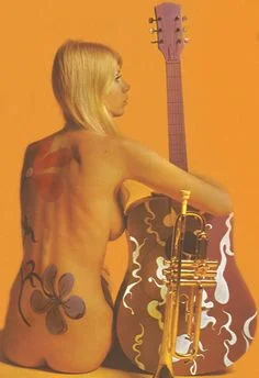 Flowers were always a popular theme in face and body paint.