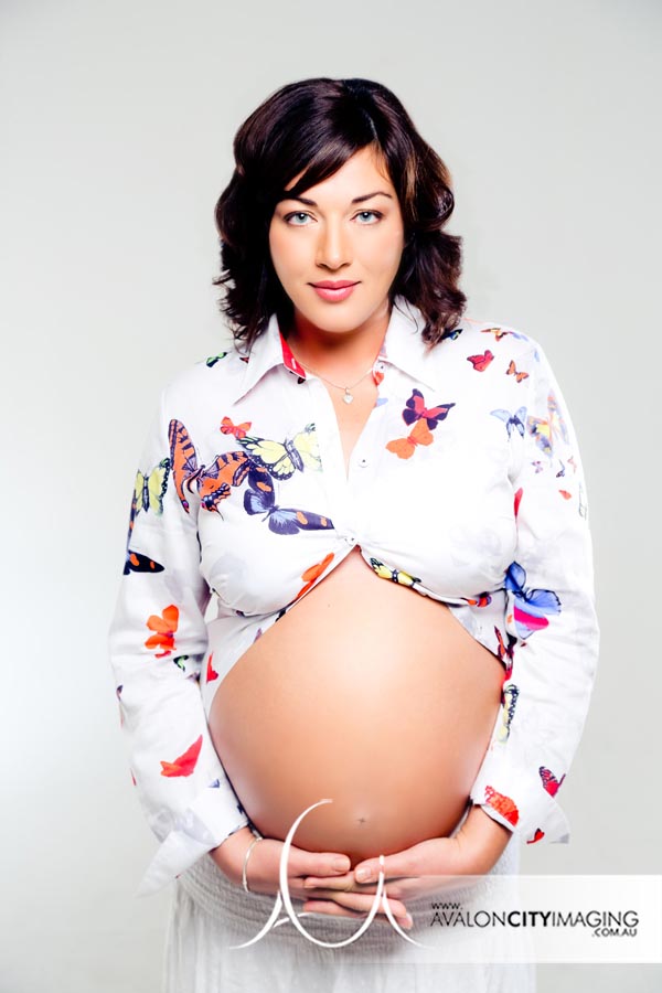 Maternity photograph of lady in colourful shirt