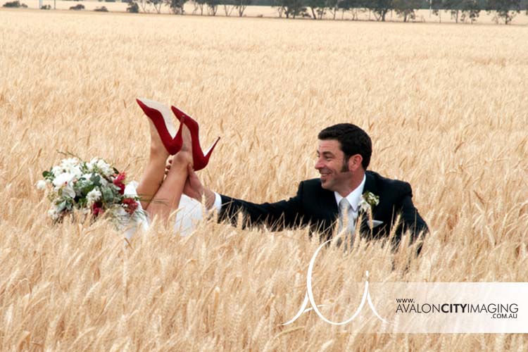 Bride's feet in the air on wedding day Adelaide photography