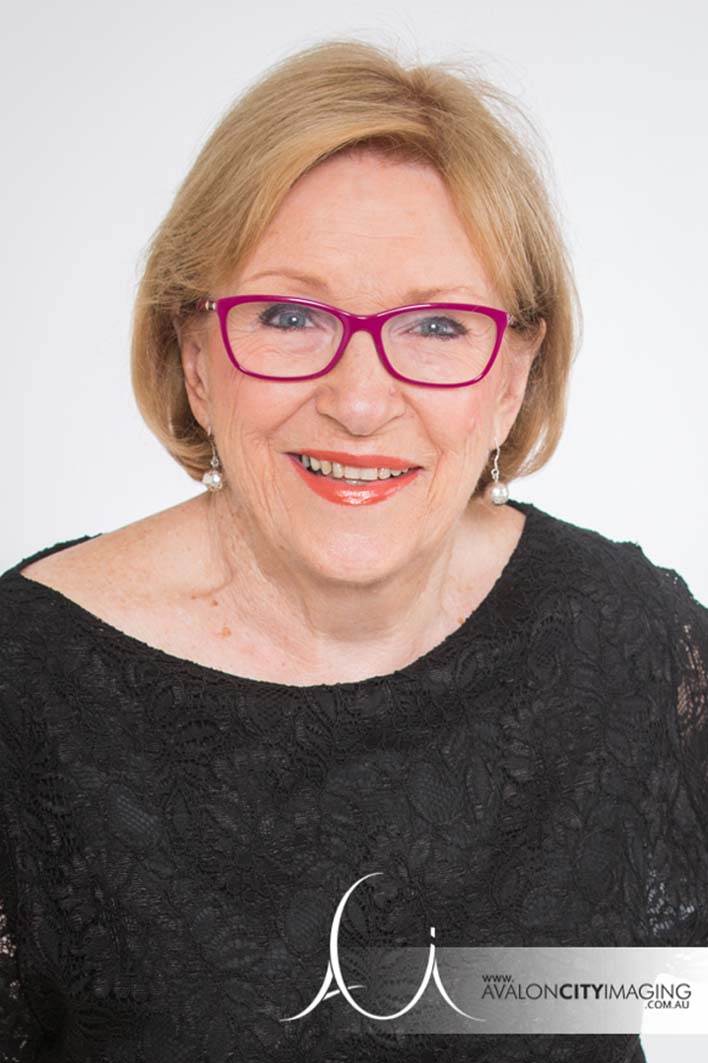 Corporate photography of Adelaide business woman in red glasses