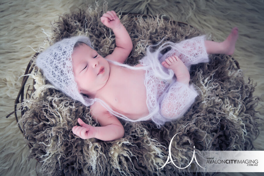 Cute photograph of newborn baby in Adelaide studio