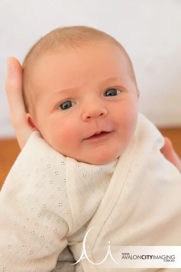 Adelaide newborn photography - Smiling newborn portrait