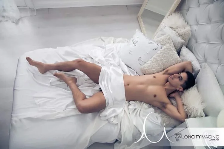 nude photography- male nude fine‑art pose with clean minimalist styling.jpg