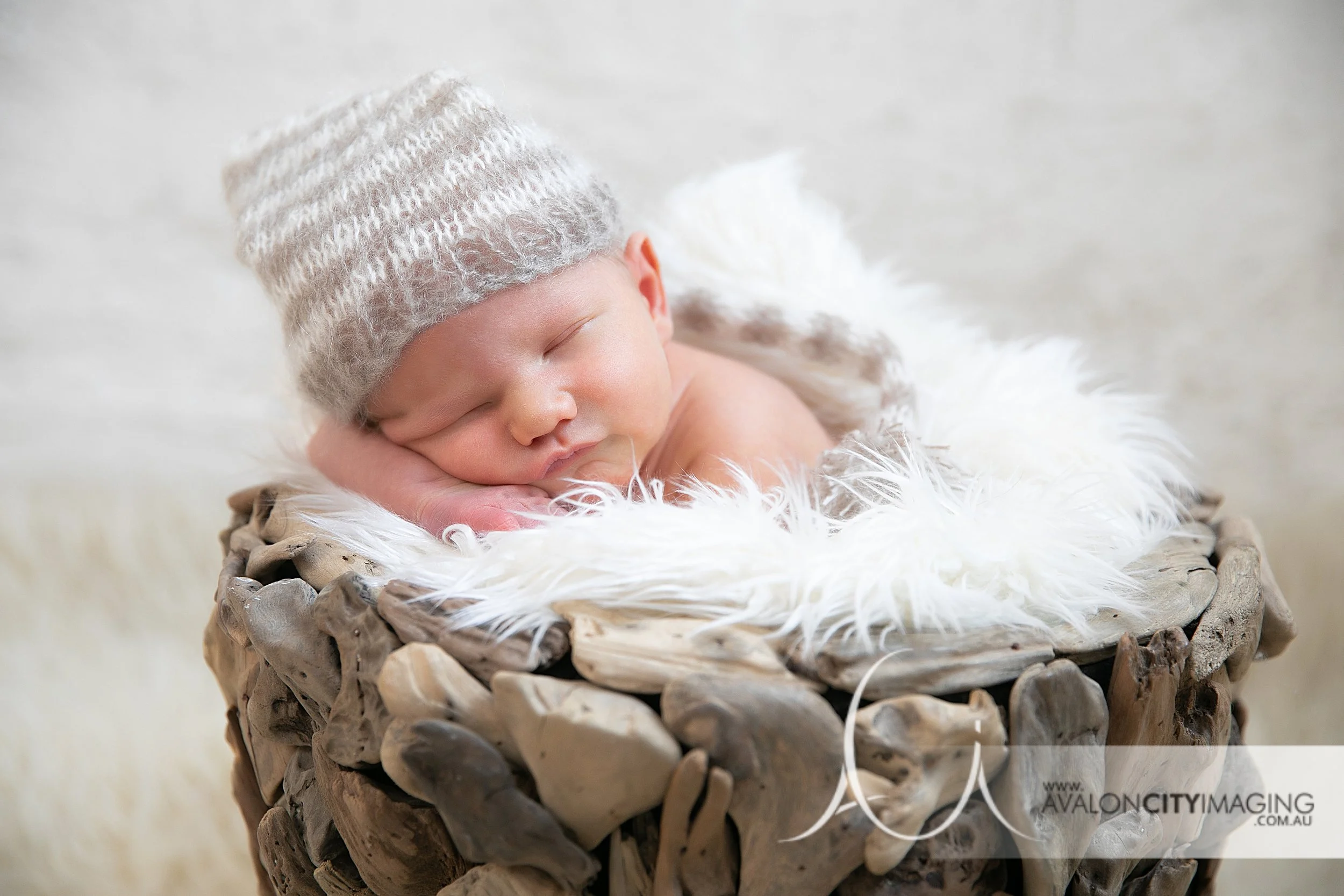 newborn photography - newborn resting in a peaceful side‑lying pose.jpg