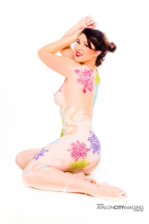 body art photography - colourful body painting on a contrasting white backdrop.jpg