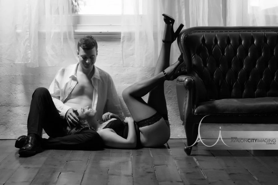 Couples Boudoir- couple embracing with gentle, natural expression.jpg