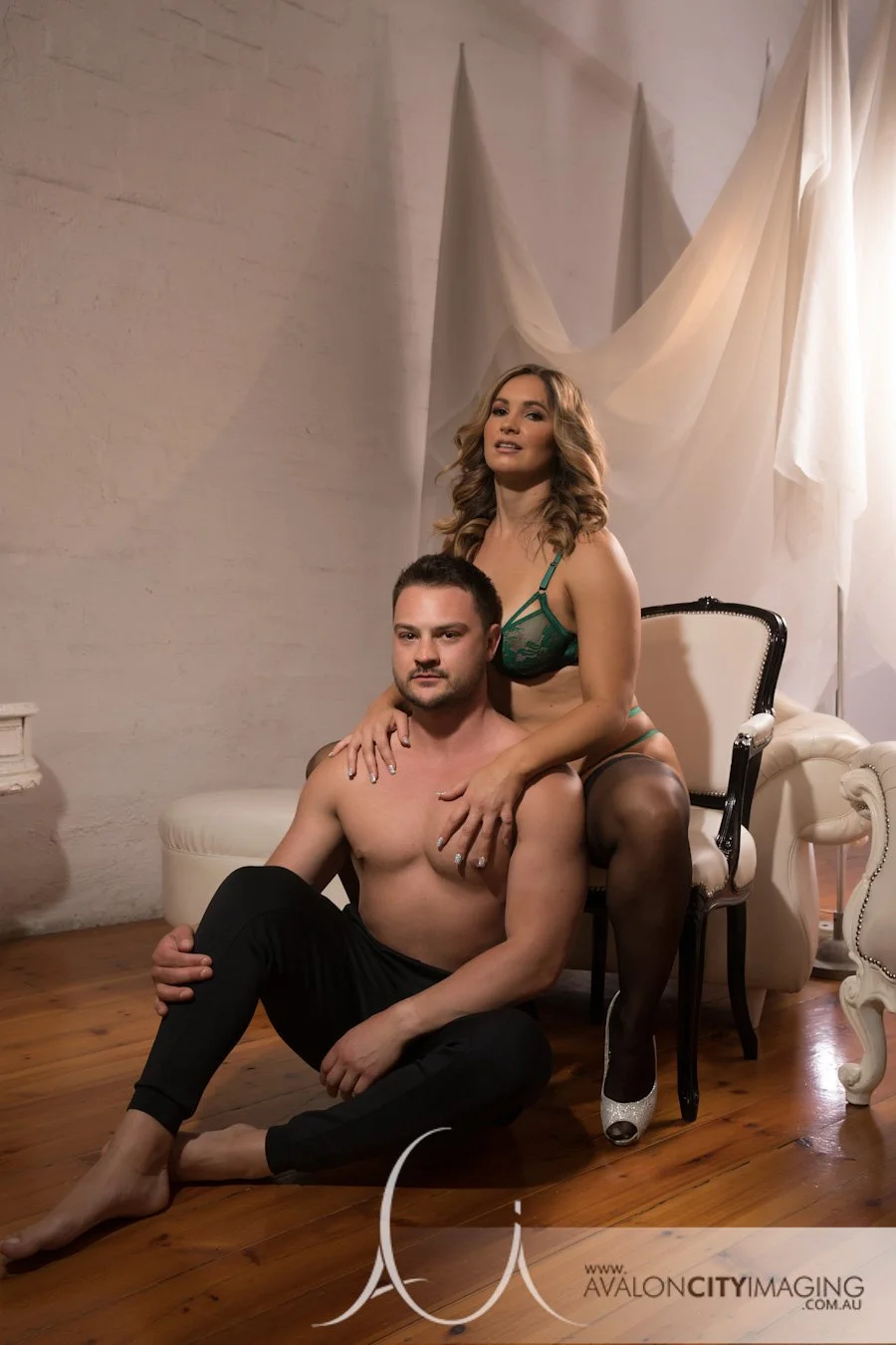 Couples Boudoir- couple leaning together with soft, flattering light.jpg