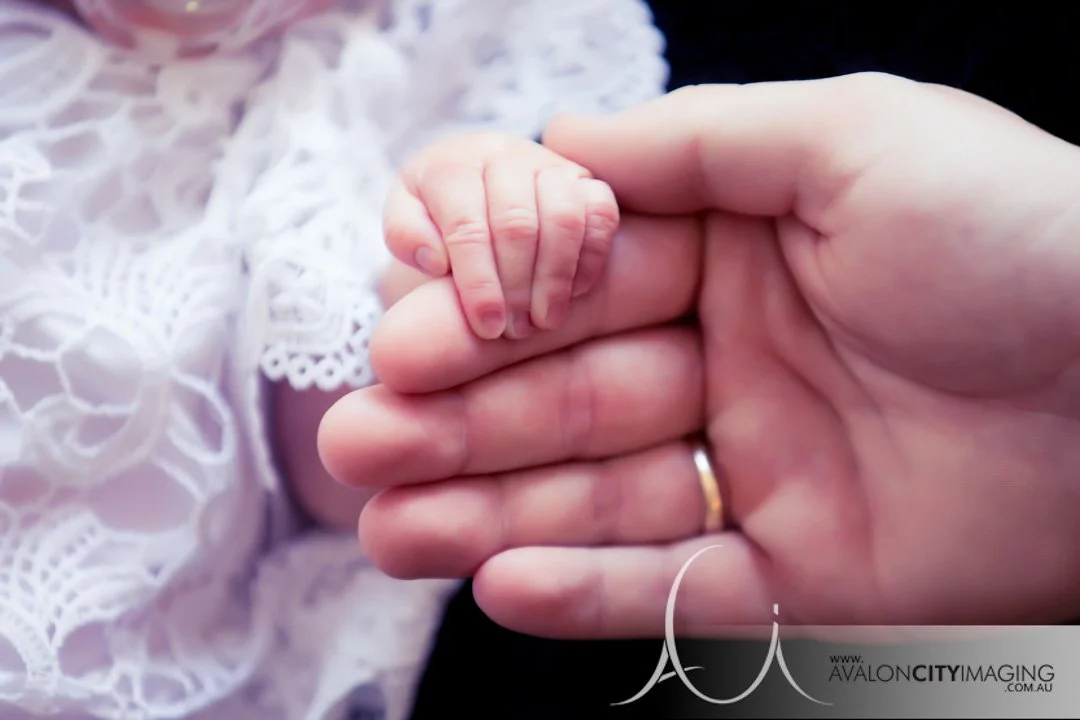 Adelaide Newborn Photography - Newborn baby hand being held by parent