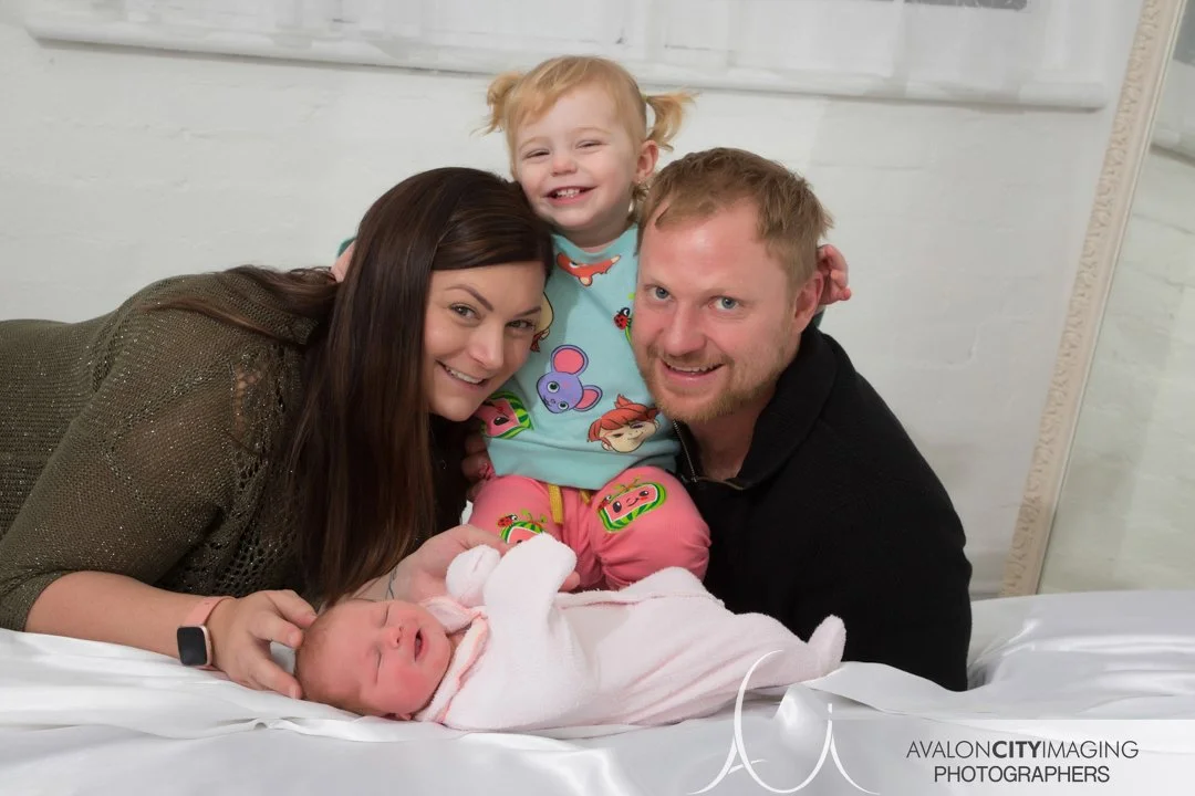 Adelaide Newborn and family photography - Happy parents and big sister with newborn baby