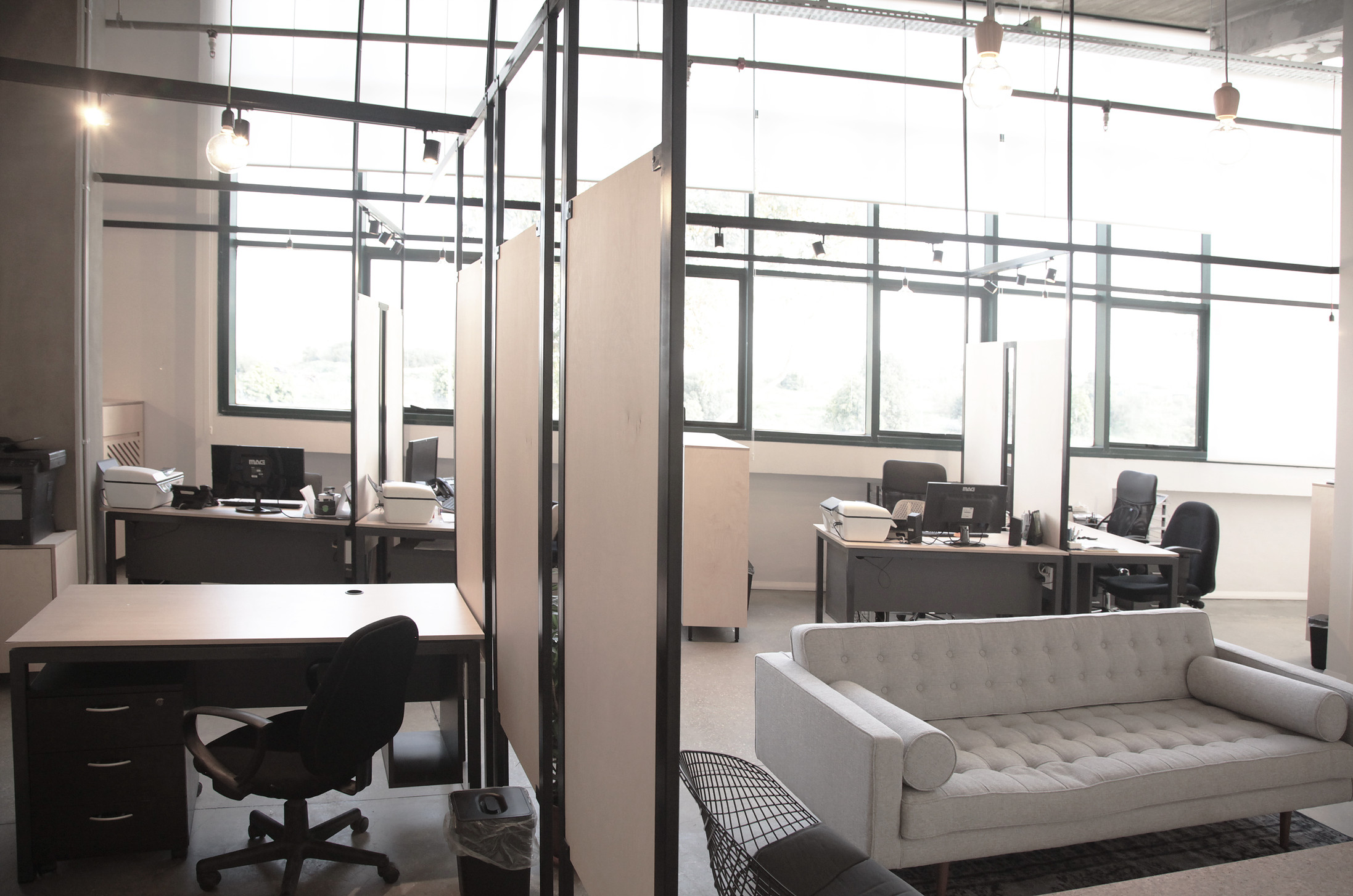 steel construction of wood dividers combined with lighting.