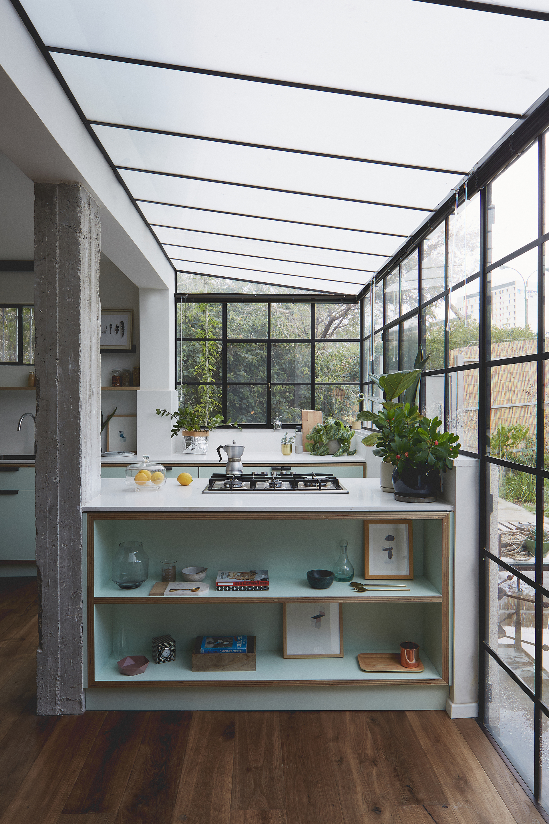 greenhouse-like kitchen in mint green