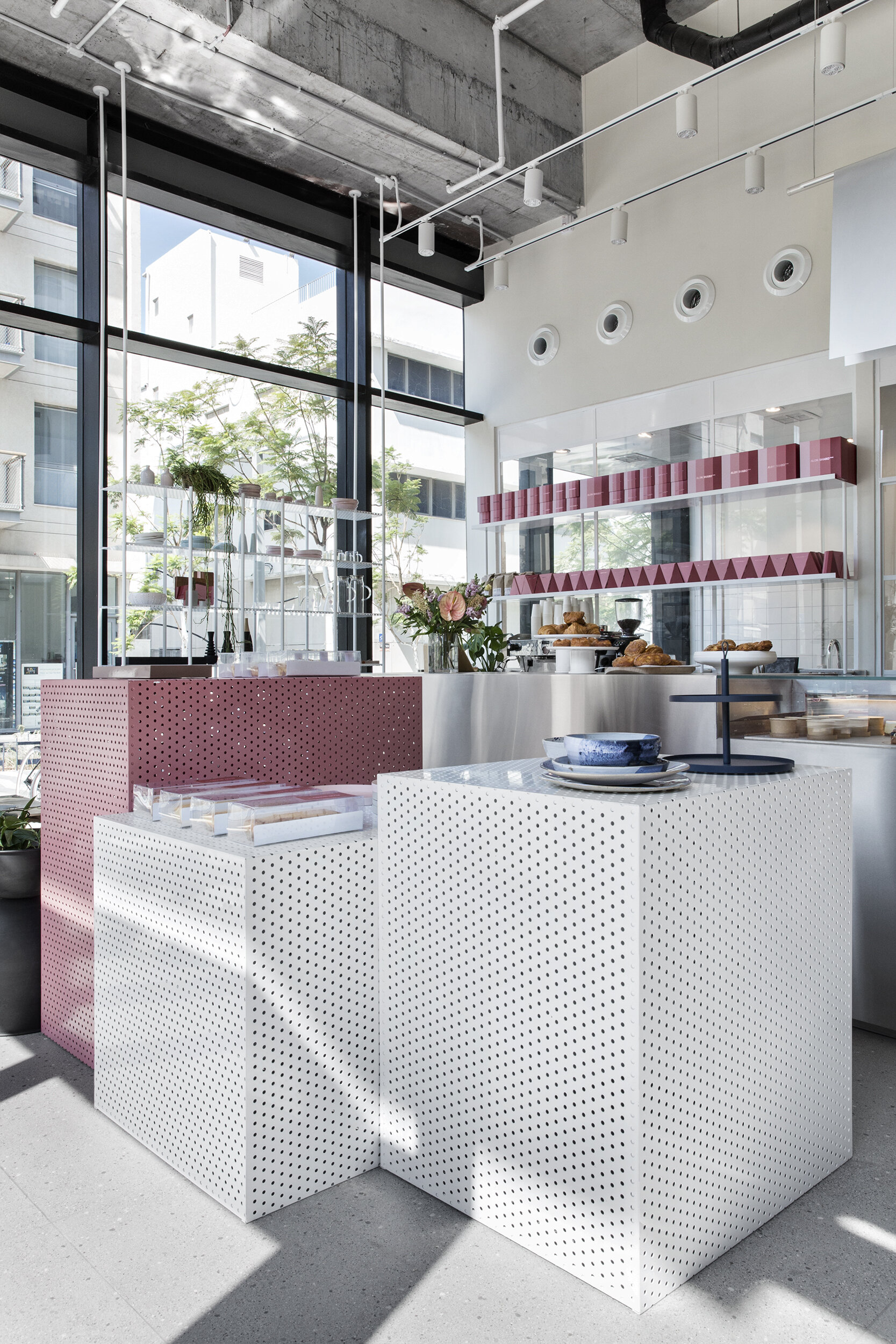Alon Shabo store, pink and white powder coated perforated metal display boxes