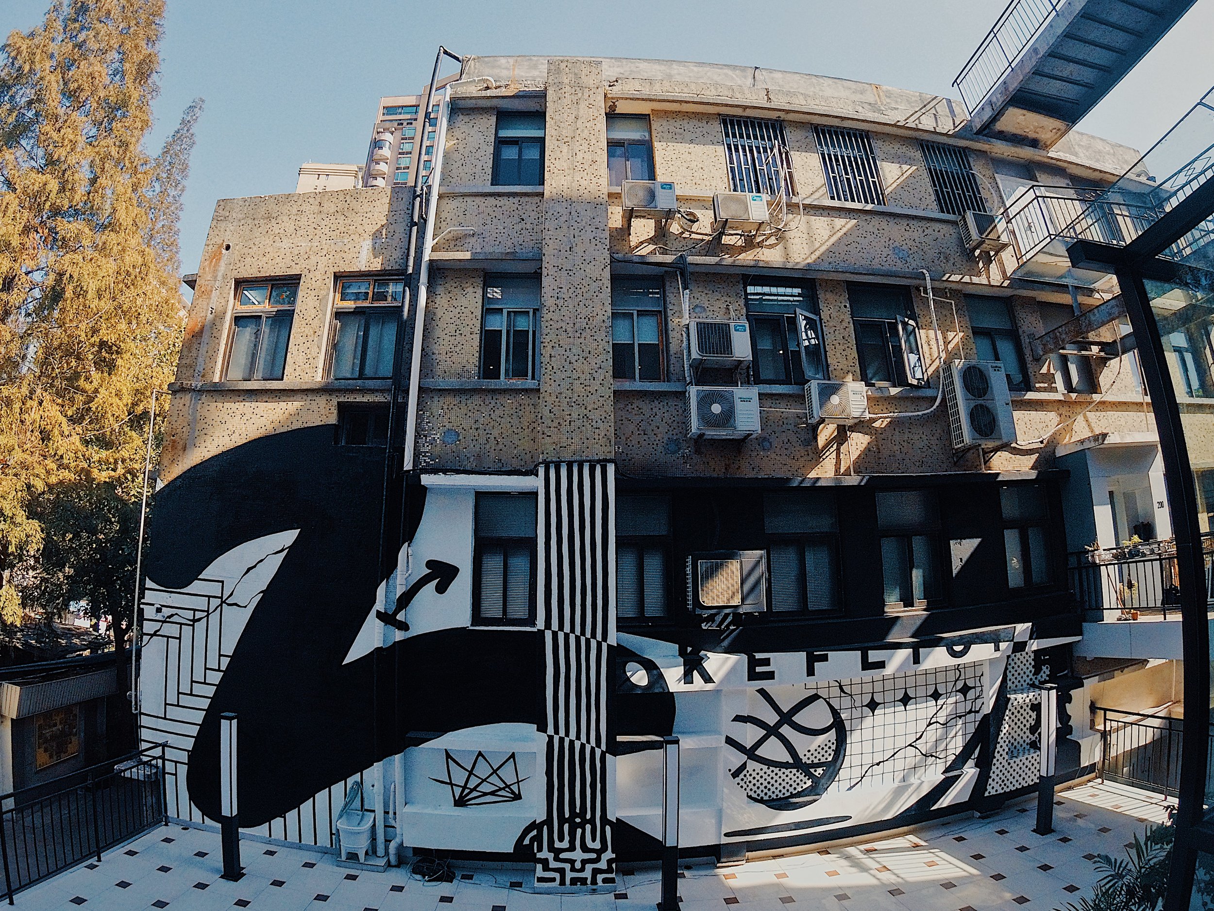 Keflione large scale mural Shanghai 2019, black and white street art, basketball sports urban wall painting