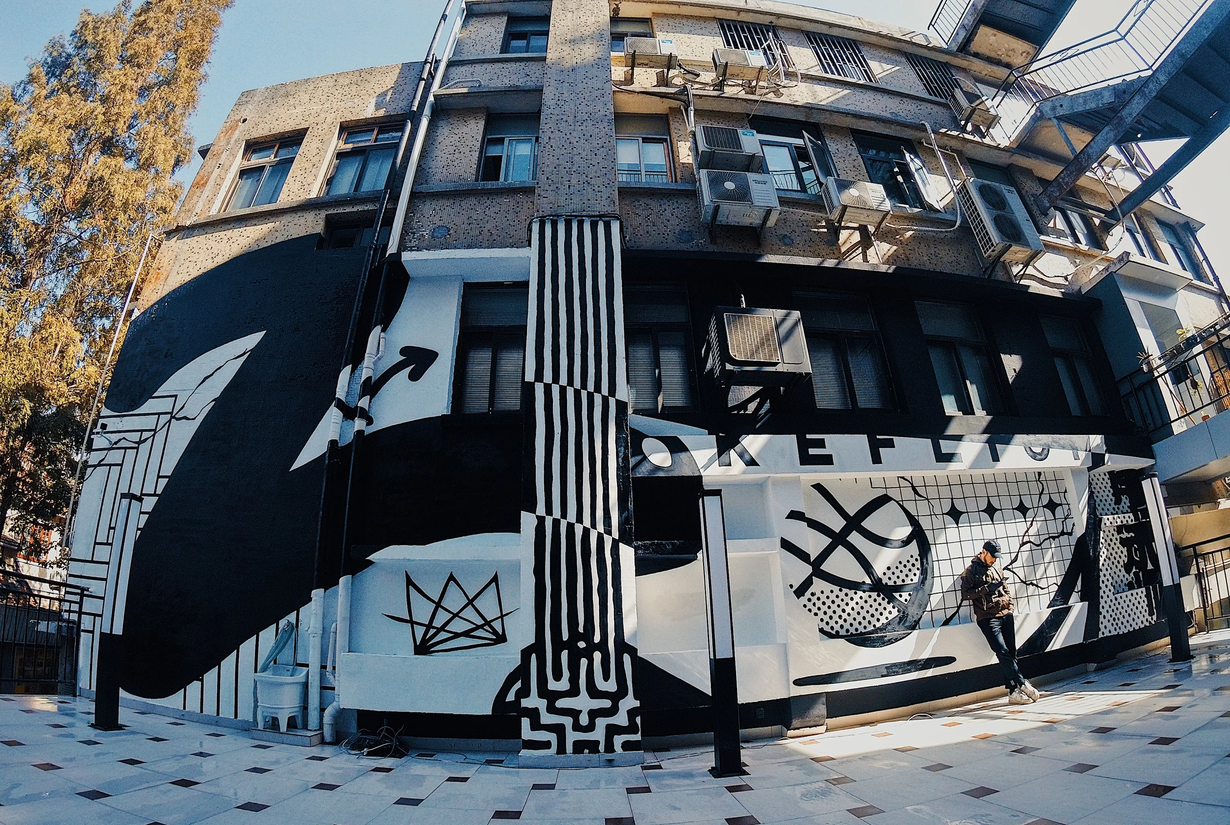 Keflione large scale mural Shanghai 2019, black and white street art, basketball sports urban wall painting
