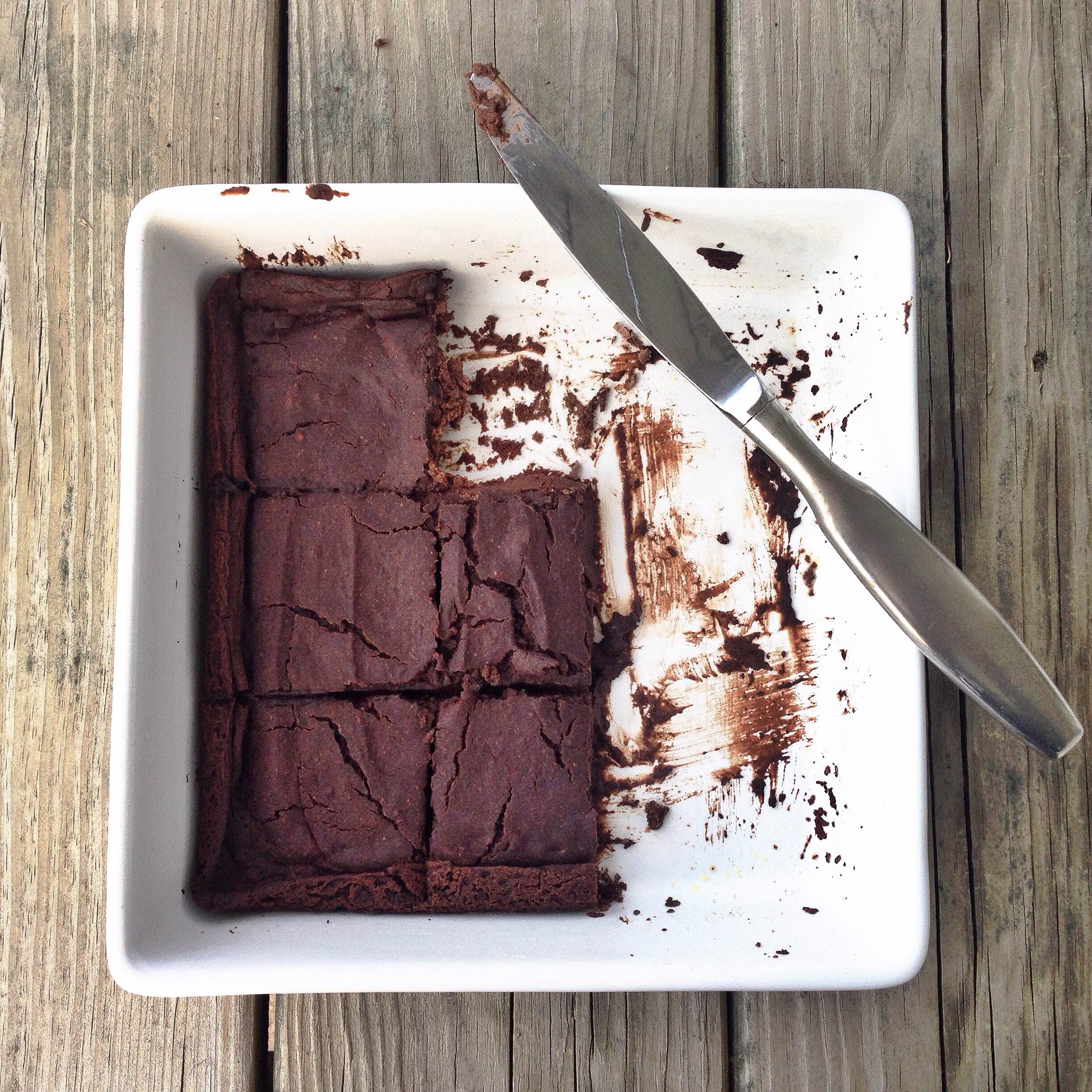 These flourless brownies are very gooey when they are warm, almost like a brownie pudding! Once they are chilled they are thick like fudge! Enjoy them either way! The best news is that instead of flour these brownies use black beans and zucchini for the base of the batter plus tons of cacao (or cocoa) powder. What I love about cacao powder is that it is rich in antioxidants plus it adds fiber, magnesium, and iron to the brownies. You can find cacao powder in the natural food baking section of the grocery store, at health food stores, or at on-line retailers. 