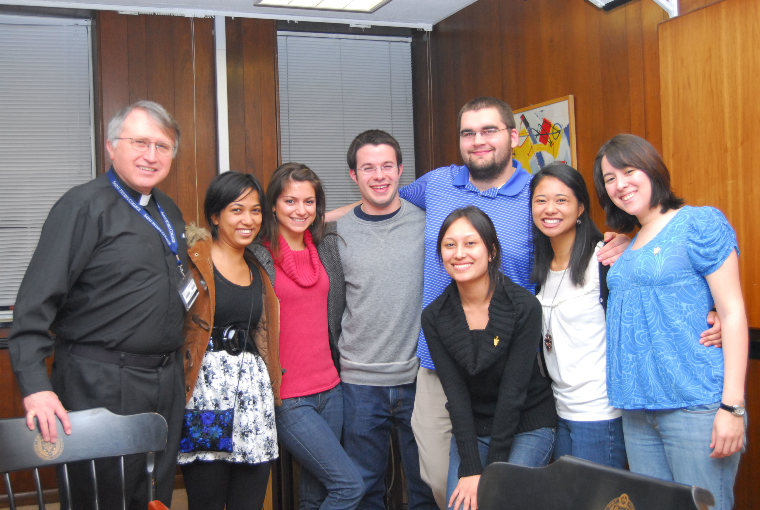 The Alpha Sigma Nu chapter at Saint Peter's in 2010. Pictured from left to right: Rev. Michael Braden, S.J., Alisha Chitrakar '10, Mariya Marinova '10, Gary Young '10, Jacob Hayden '10, Rezma Shrestha '10, Peaches Dela Paz '10 and Veronica Graveline '10. (Photo courtesy of Saint Peter's)