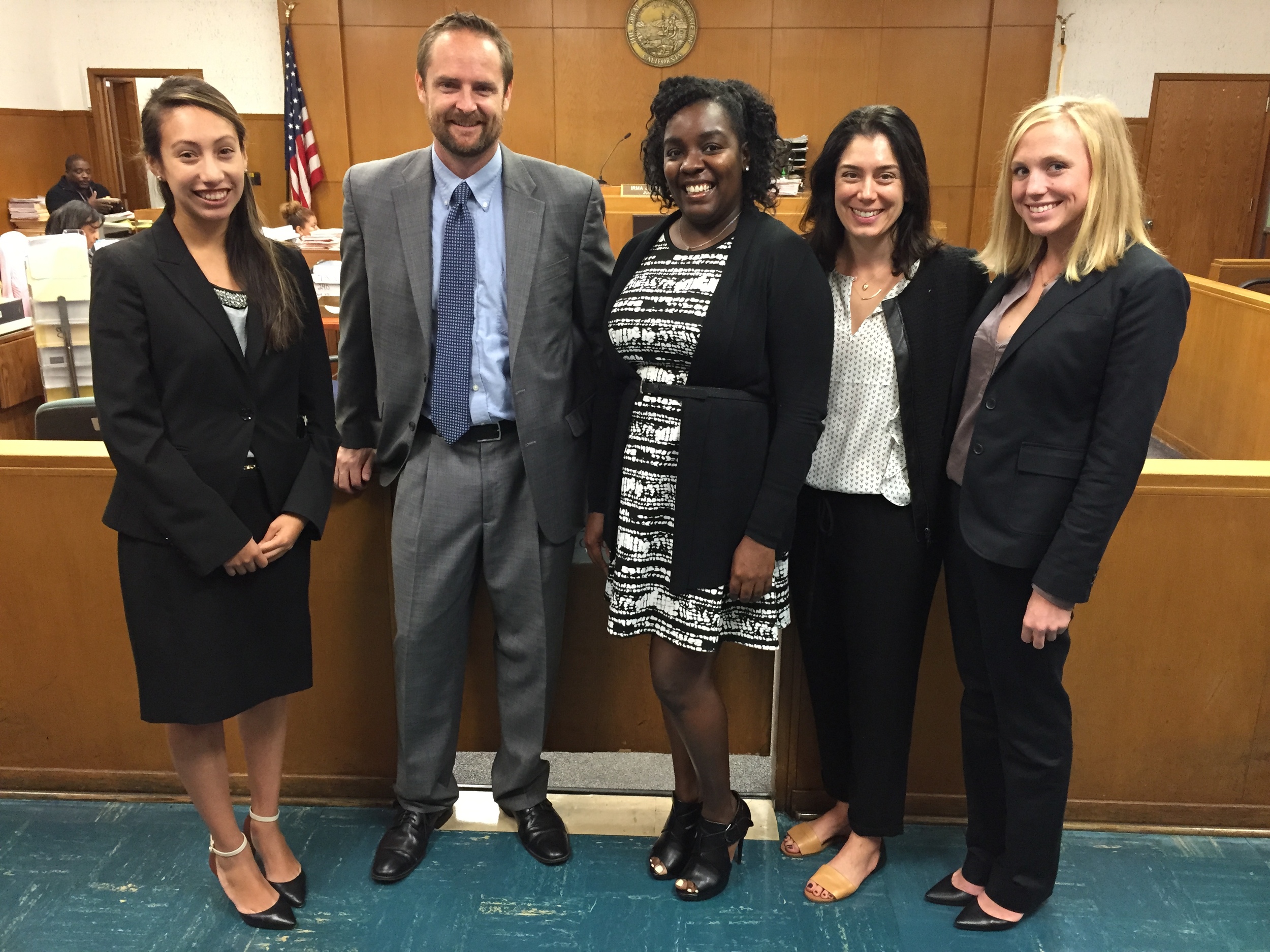 JJC Clinical Co-Director Samantha Buckingham flanked in Inglewood Juvenile Court by CJLP alumni Camila Alvarez (JJC, '15), Erik Rodstrom (JJC, '08, now a public defender), Sherise Francis (JJC, '09, now a public defender) and Lilian Walden (YJEC, '15). Photo Courtesy of Loyola Marymount University.