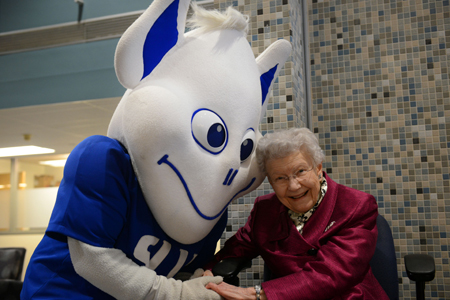 Mary Bruemmer with the SLU Billiken (Photo by Saint Louis University)