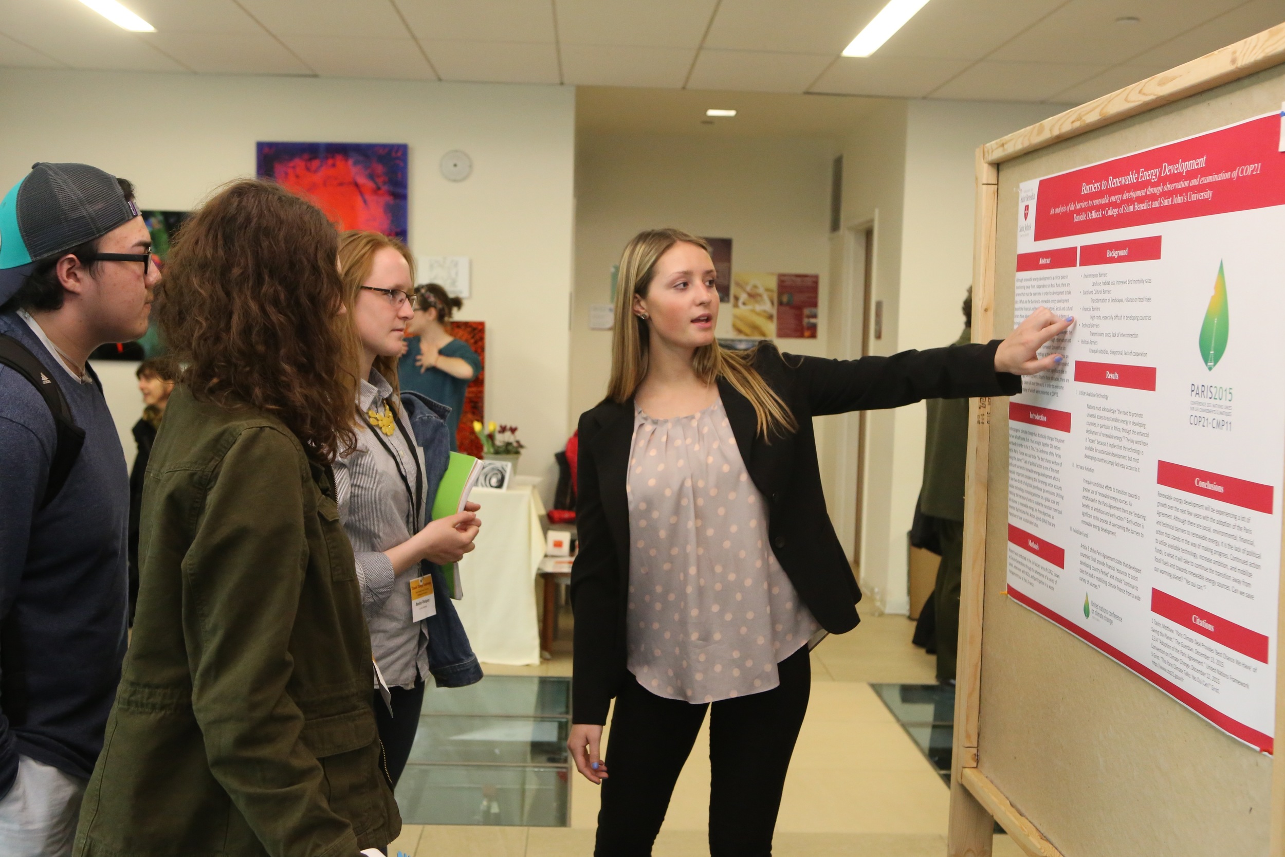 Students at a poster session during Loyola University Chicago's 2016 Climate Change Conference (Photo by Mark Beane)