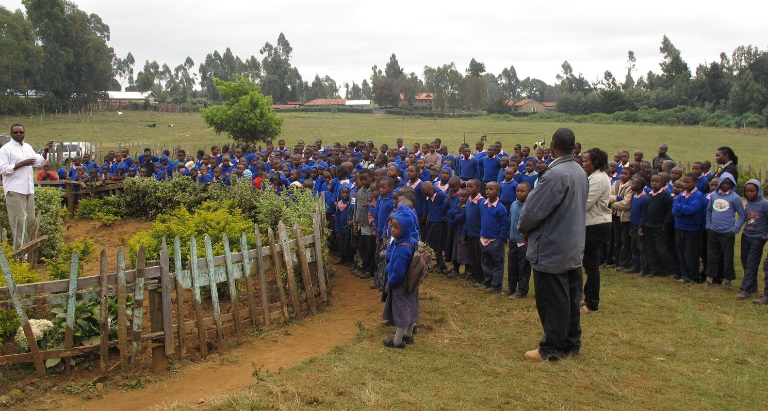 Meme Kinoti with children in Africa (Photo by Brett Stakelin)