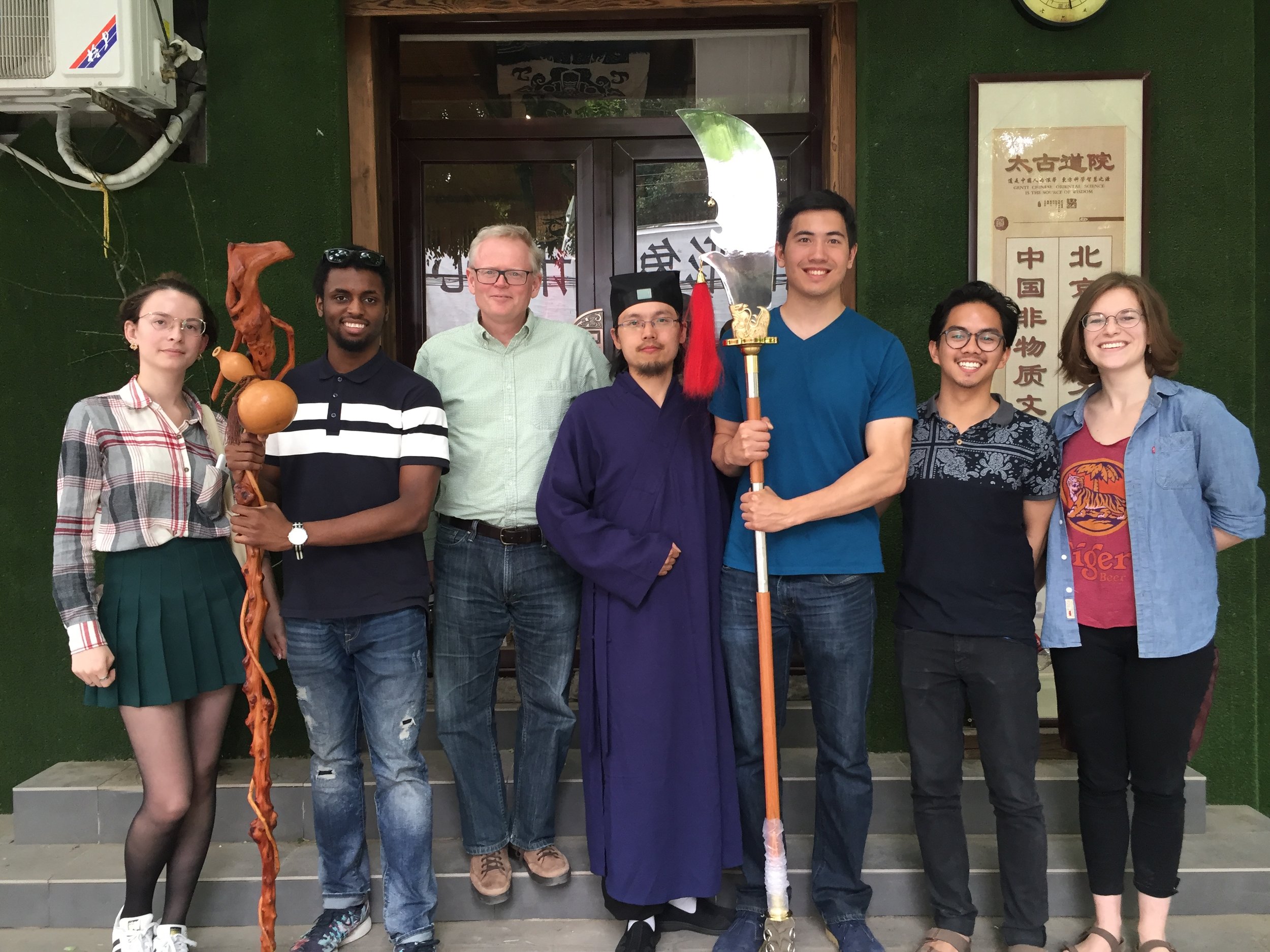 Ian Johnson (third from left) with TBC students at the office of a Daoist priest in China (Photo Courtesy of Dr. Amanda Barry)