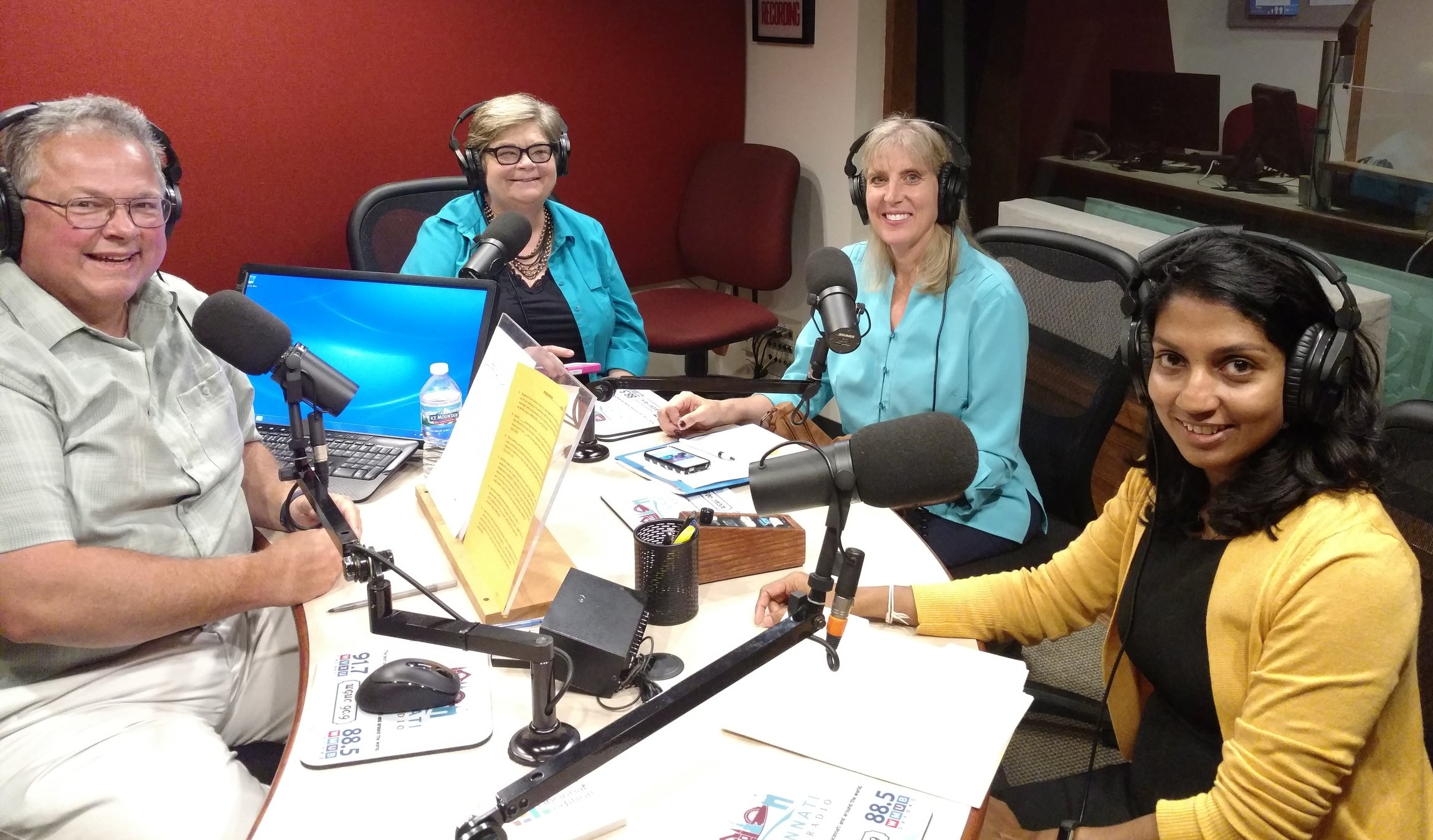 Photo: Dr. Debra Mooney (second from right) joins the WVXU public radio station to present on Xavier’s immigration education efforts with the host of Cincinnati Edition , Mark Heyne, and two grant recipients, Drs. Christine Anderson (second from left) and Thilini Ariyachandra (right) (Photo by Xavier University).