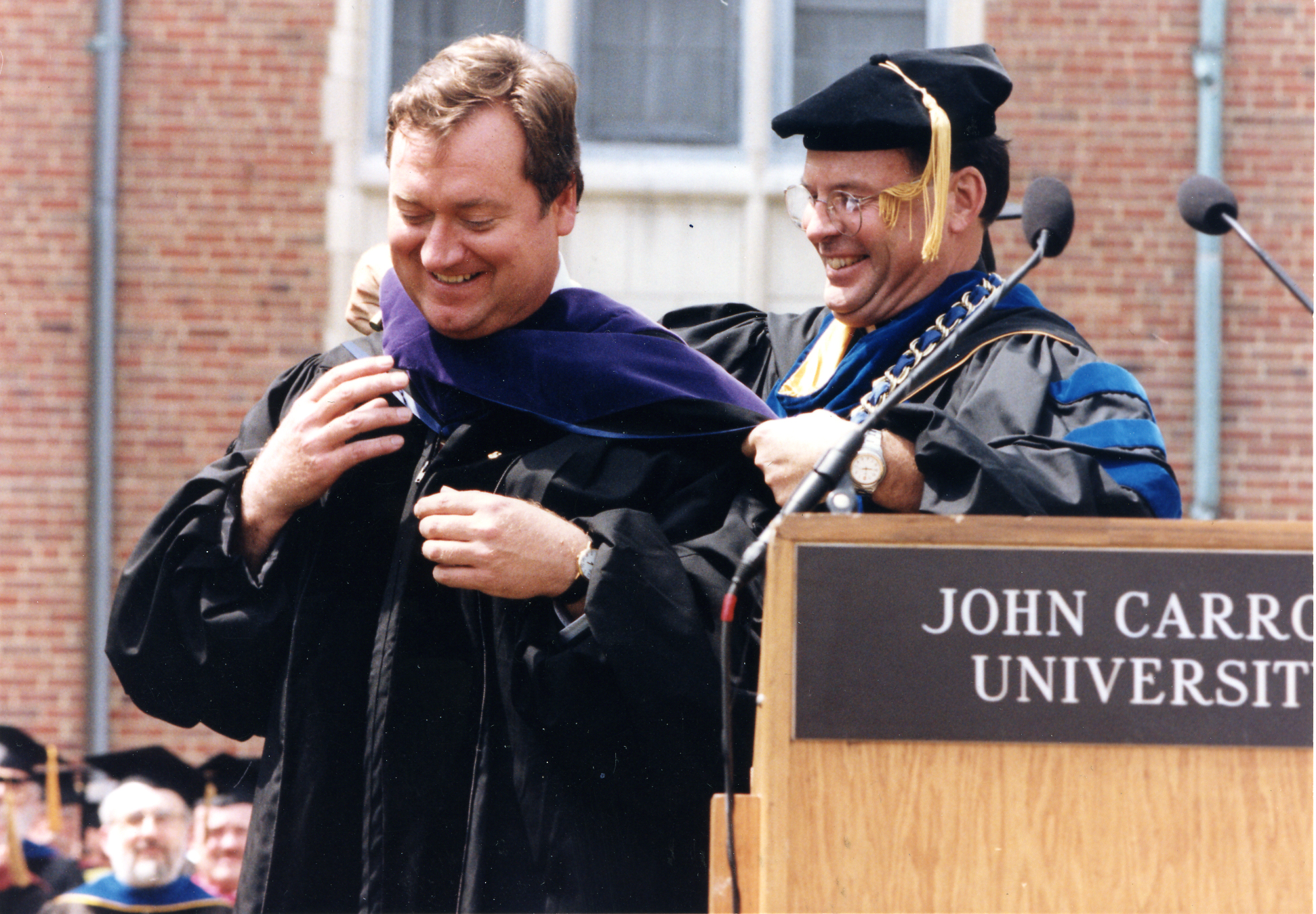 TIM RUSSERT RECEIVING AN HONORARY DEGREE FROM JOHN CARROLL UNIVERSITY IN 1997 (PHOTO BY JOHN CARROLL UNIVERSITY)