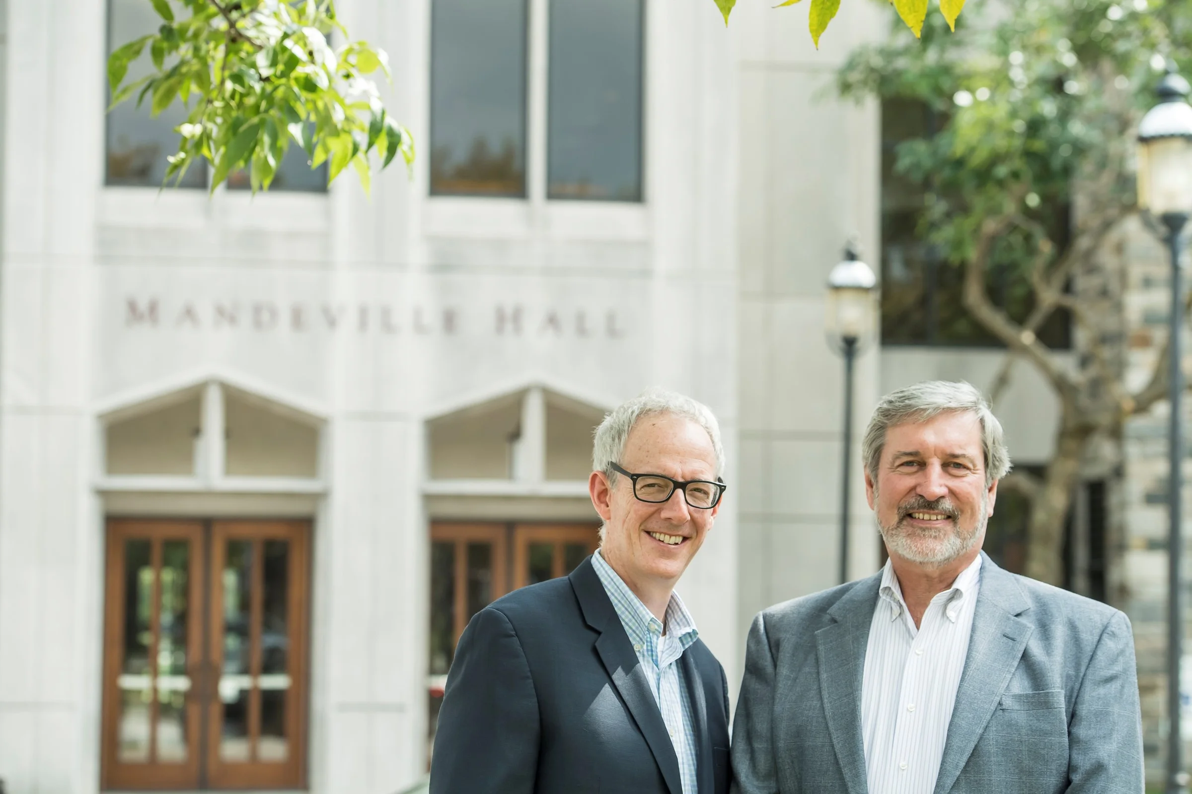 David Steingard, Ph.D., (left) and John McCall, Ph.D. in front of the Haub School of Business' Mandeville Hall (Photo by Saint Joseph's University)