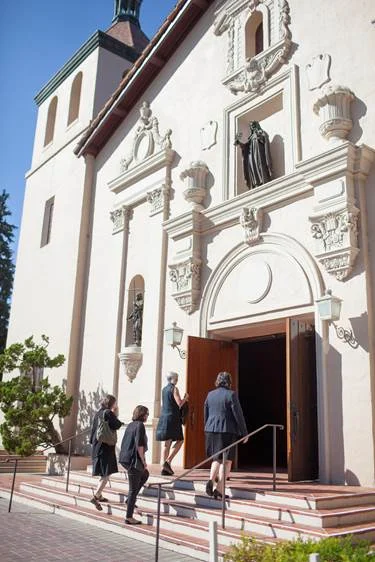 At Santa Clara’s Mission Church, students notice that they must literally “step up” to participate, and that the cool and dim interior is an invitation to calm (photo by Joanne Lee, courtesy of Santa Clara University)