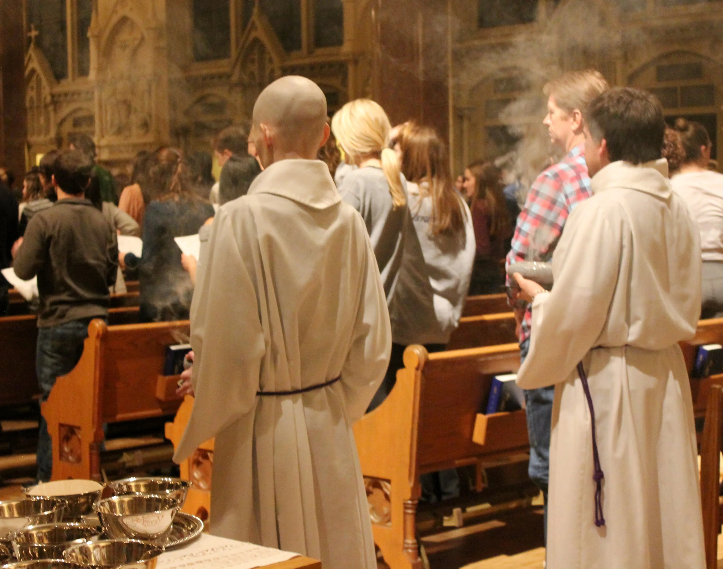 Students pray together at the 9 PM College Church Mass (photo by Molly Daily for Saint Louis University)