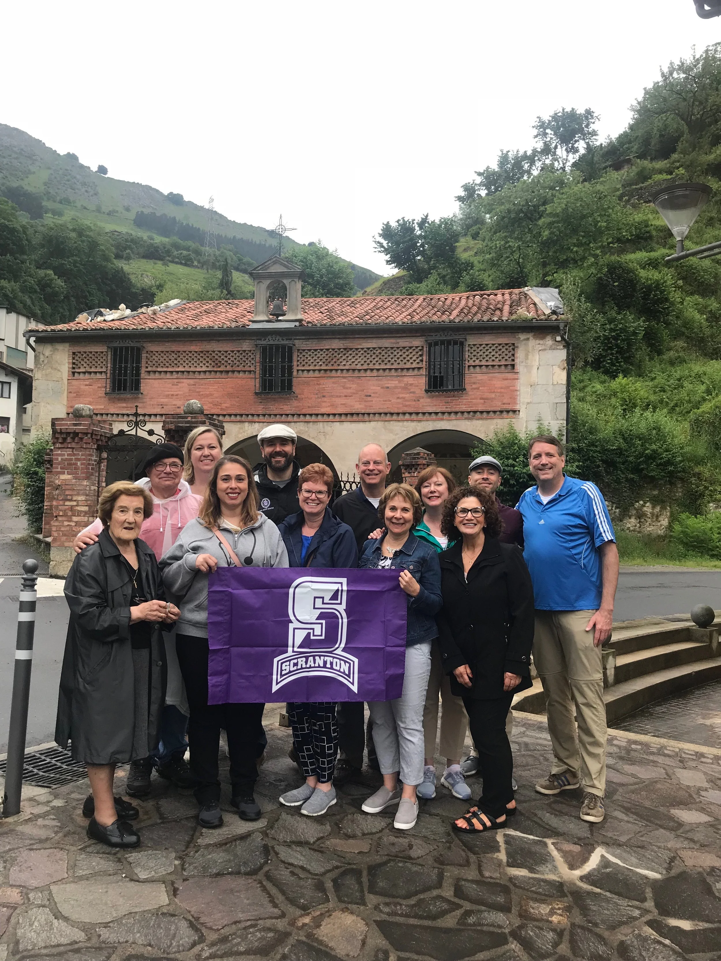 University of Scranton staff and faculty at the chapel and hospital on the outskirts of Azpetia where Ignatius lived and worked with the poor (photo by University of Scranton)