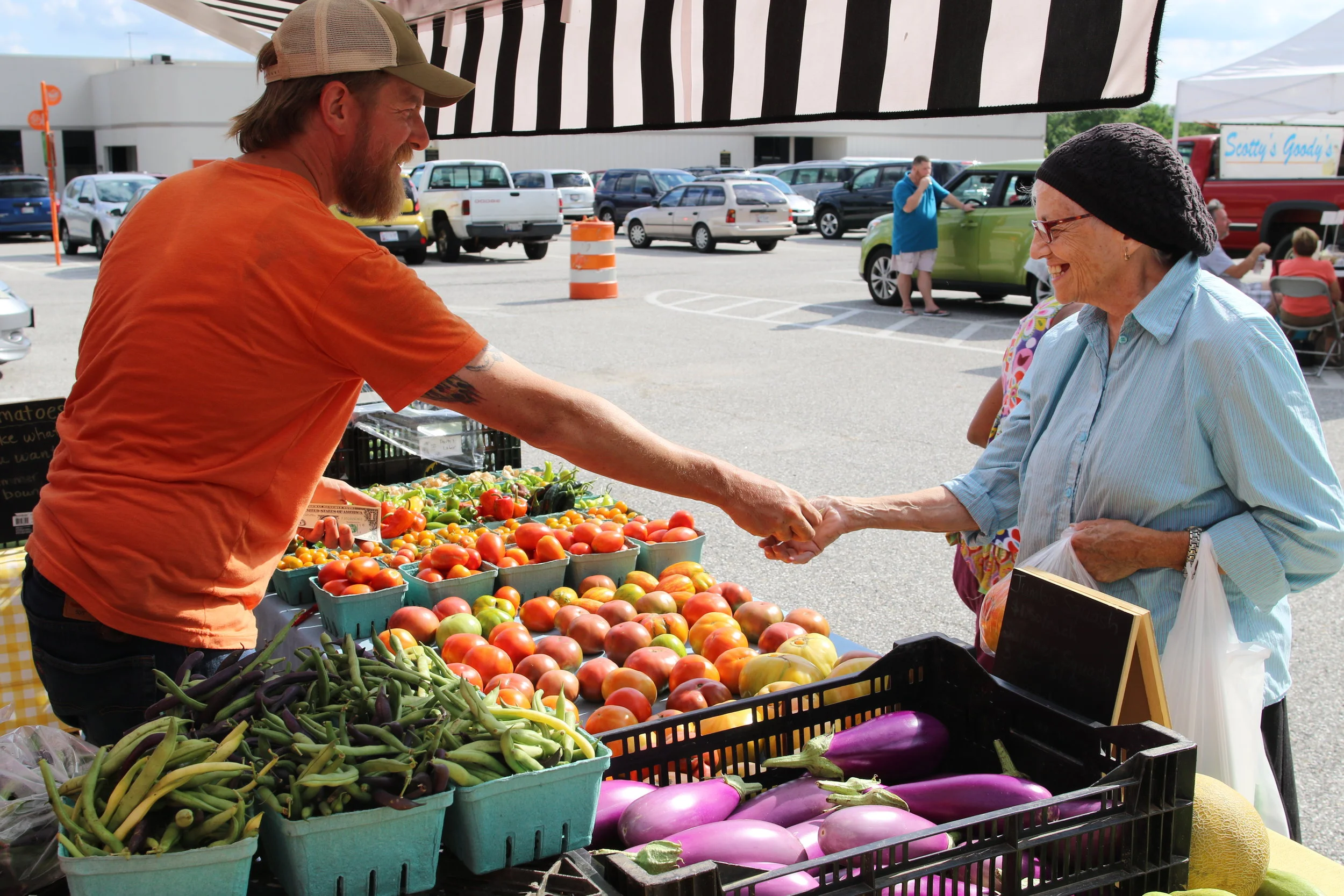 The Govanstowne Farmer’s Market, a Loyola University Maryland program, is a hub of activity on Wednesdays during the summer (photo by Loyola University Maryland)