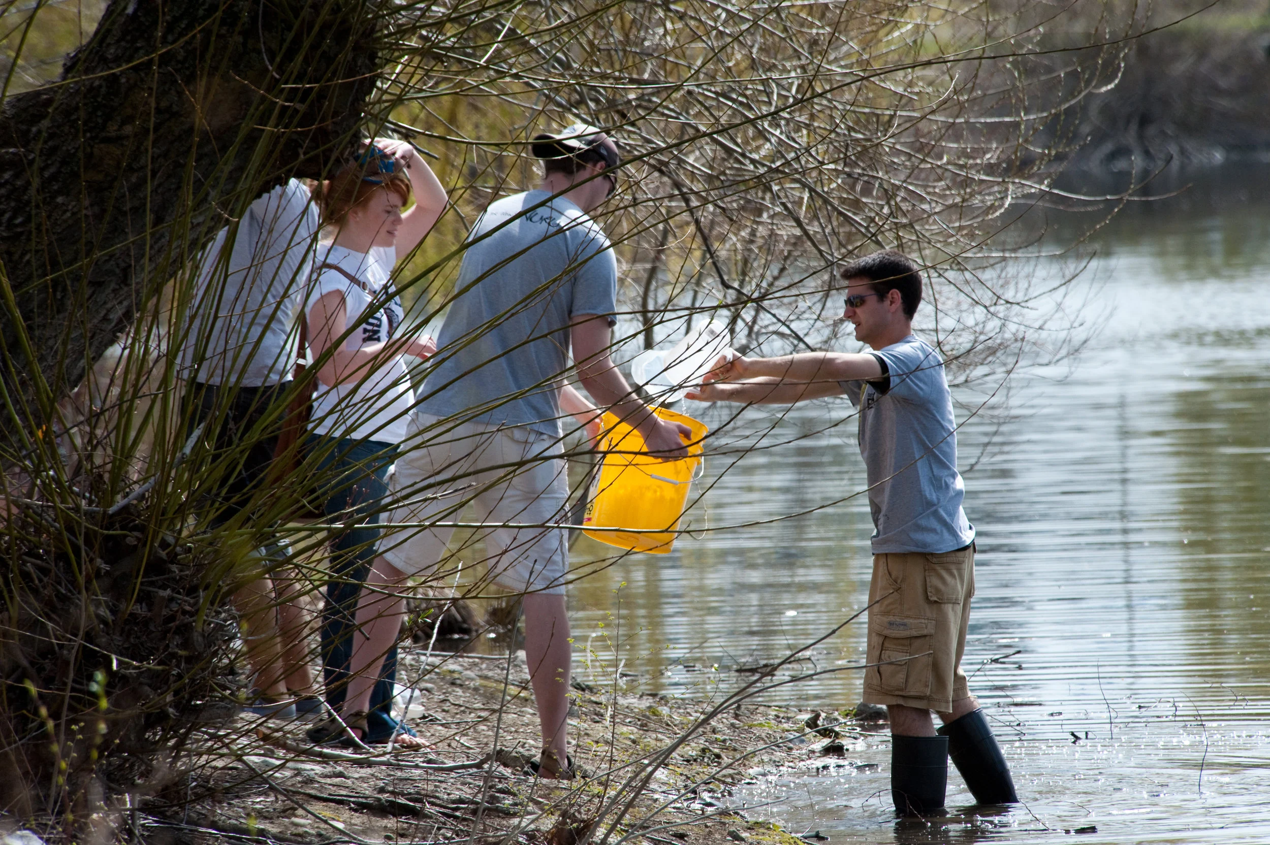 Gonzaga students studying biology, chemistry, environmental science and other disciplines collaborate on water research on the banks of Lake Arthur in Spokane, WA (photo by Gonzaga University)