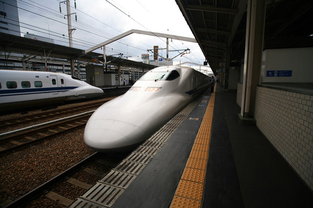 Two Nozomi Shinkansens passing one another at Himeji Station, Hyogyo Prefecture. Photo by: Flickr@LASZLO ILYES