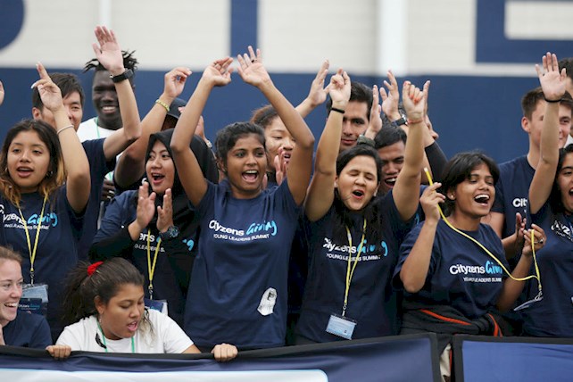 Diana Salinas (far left) celebrating the achievements of youth players participating in the youth festival. 
