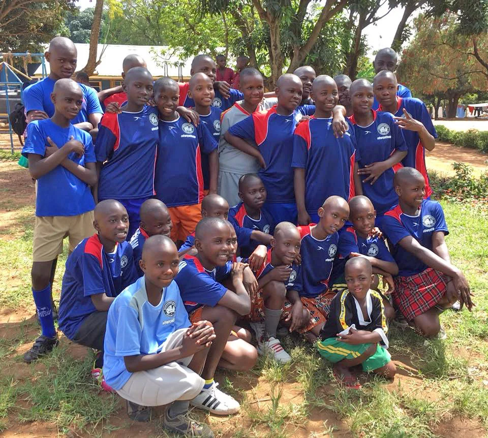 6-12 year old girls from the Mulago School of the Deaf in their new Downtown United Soccer Club jerseys.